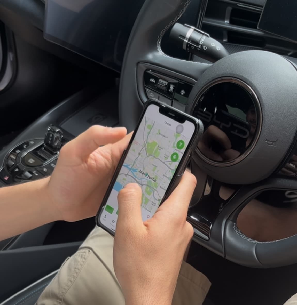 Driver finding a nearby charger